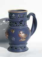 Blue and gold puzzle jug
