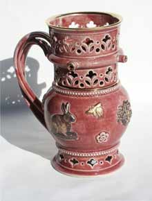 pink and gold puzzle jug