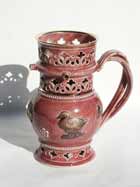 pink and gold puzzle jug